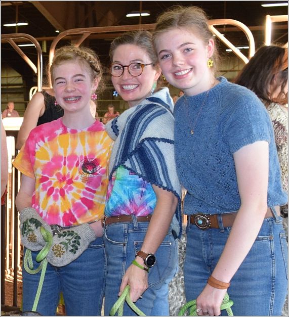 Ella, Marrisa and Anna; Marissa (center) is wearing the group-made shawl. Photo: Peggy Lundquist.
